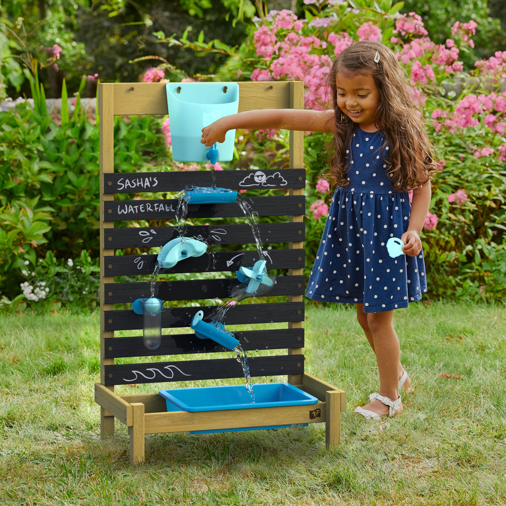 Child playing with plug & play waterfall