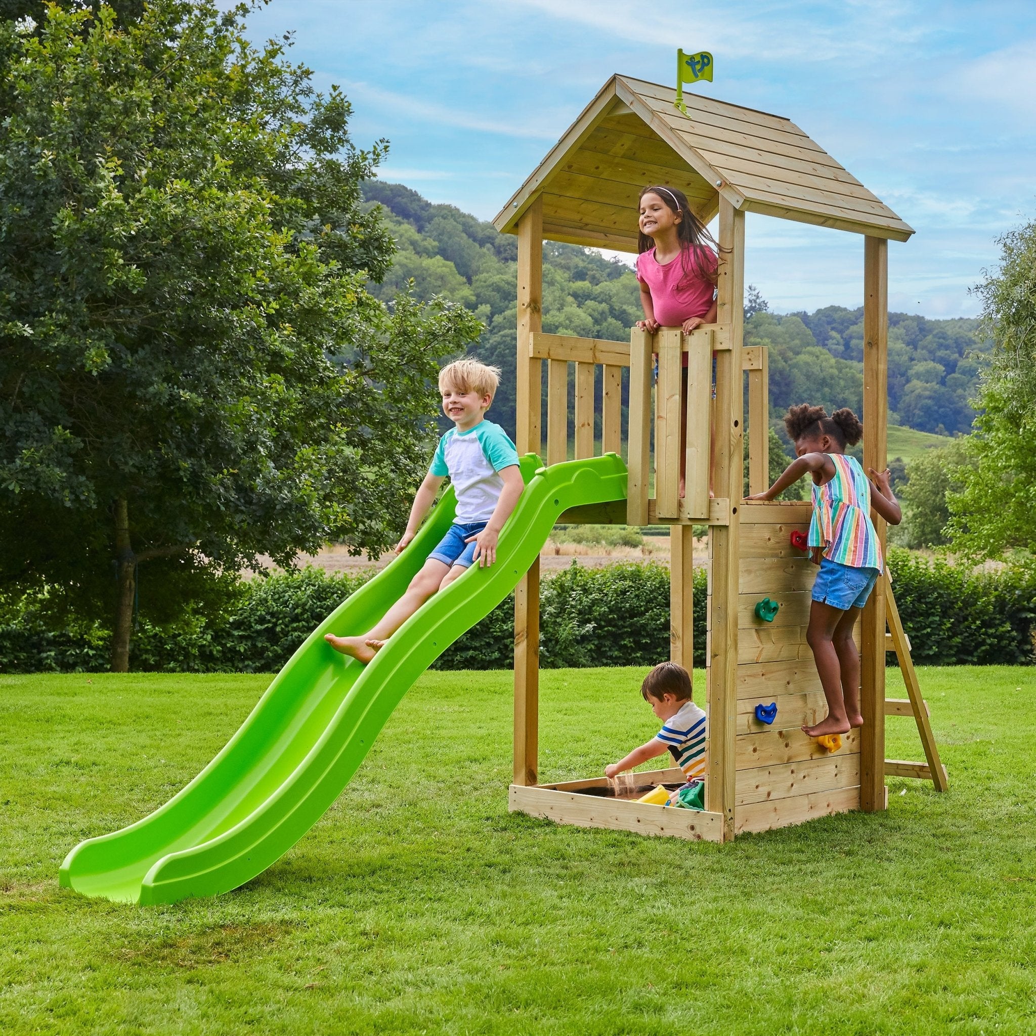  Children playing on a wooden climbing frame 